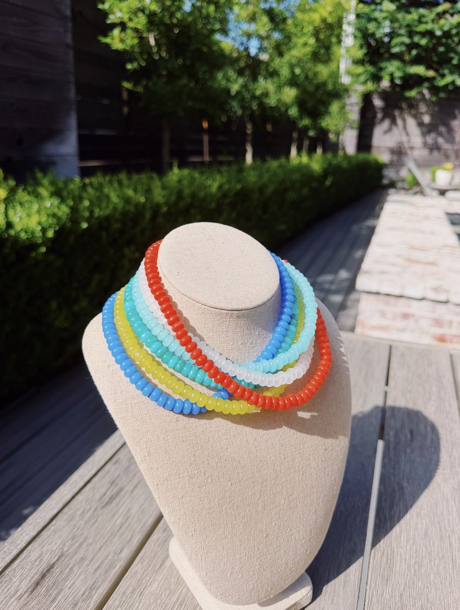 Colorful beaded necklaces on display